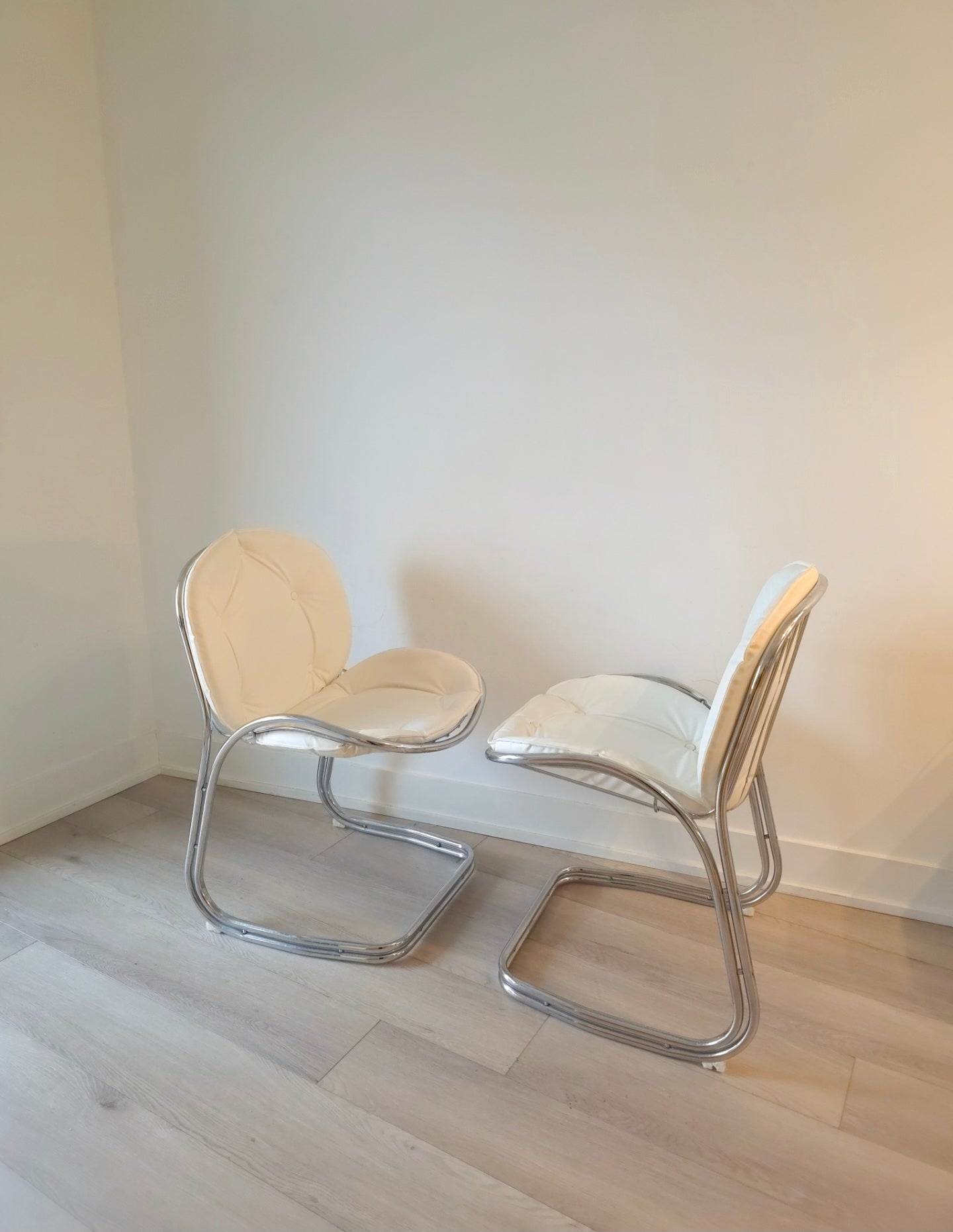 Cantilevered Chrome and leather chairs