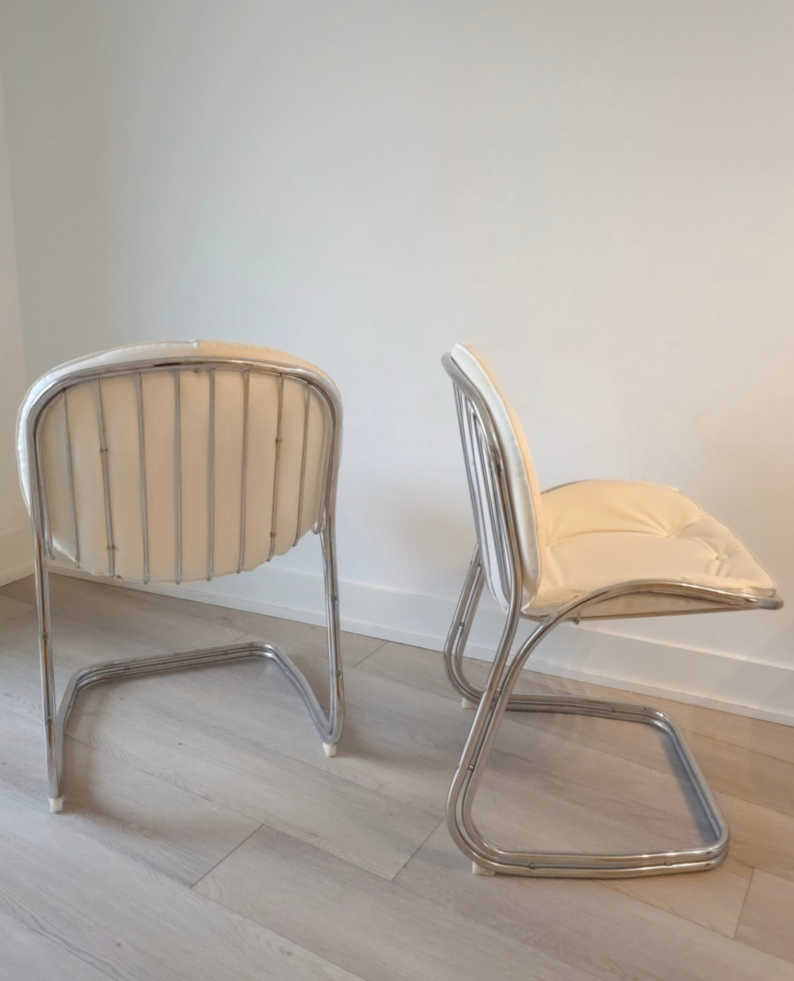 Cantilevered Chrome and leather chairs