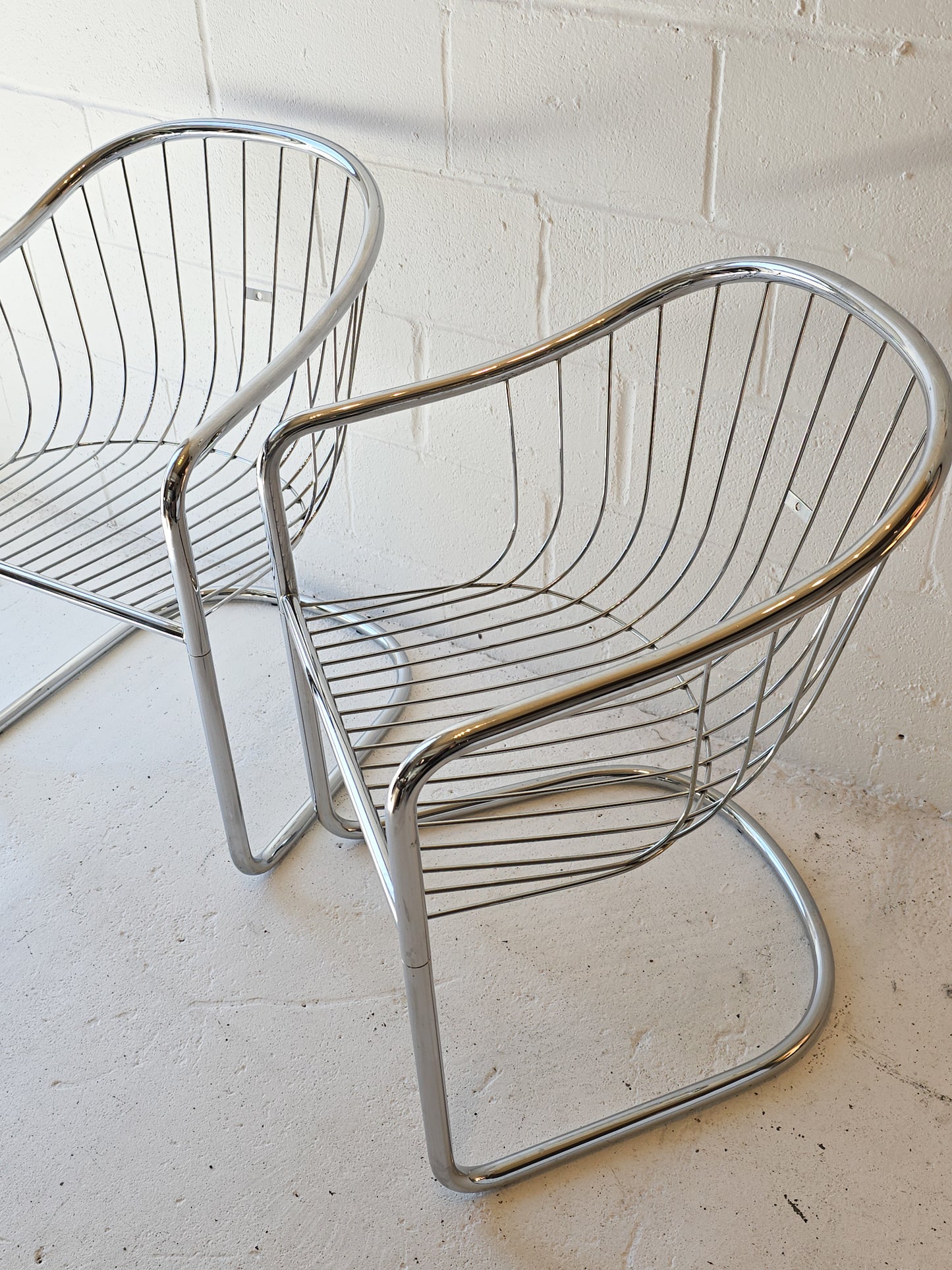 Cantilevered Chrome Chairs (One pair available)