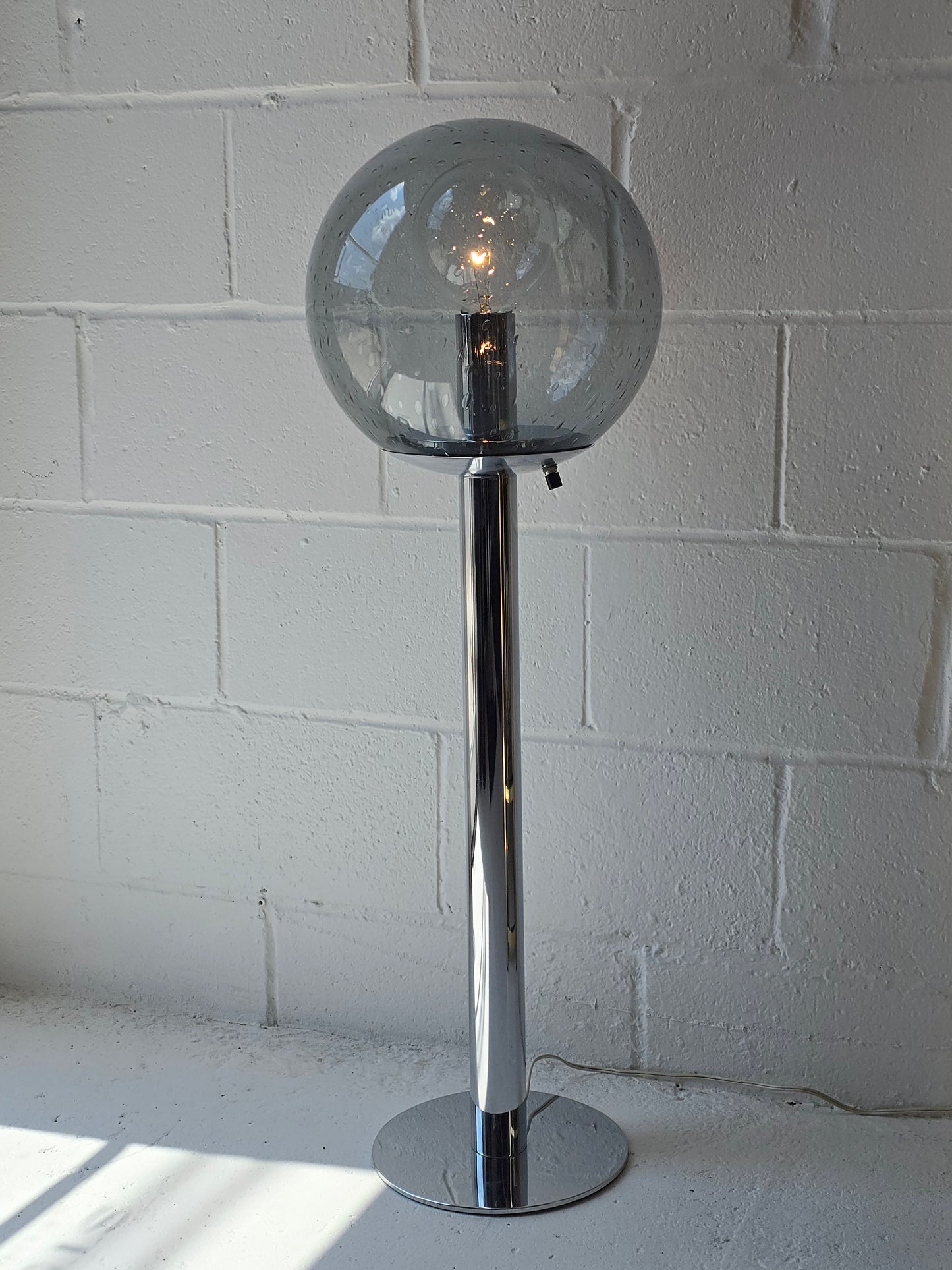 Glass Globe and Chrome Lamp