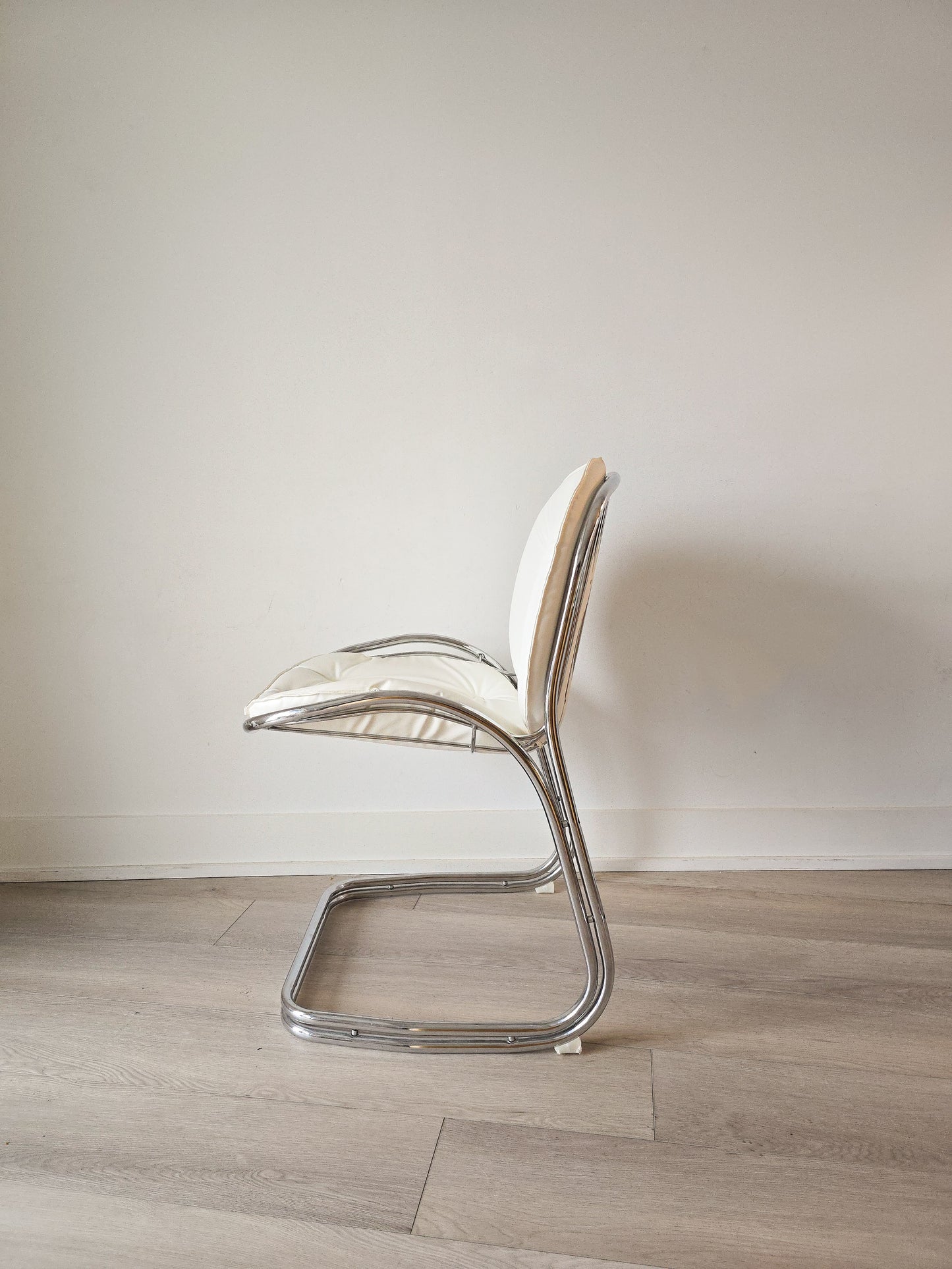 Cantilevered Chrome and leather chairs