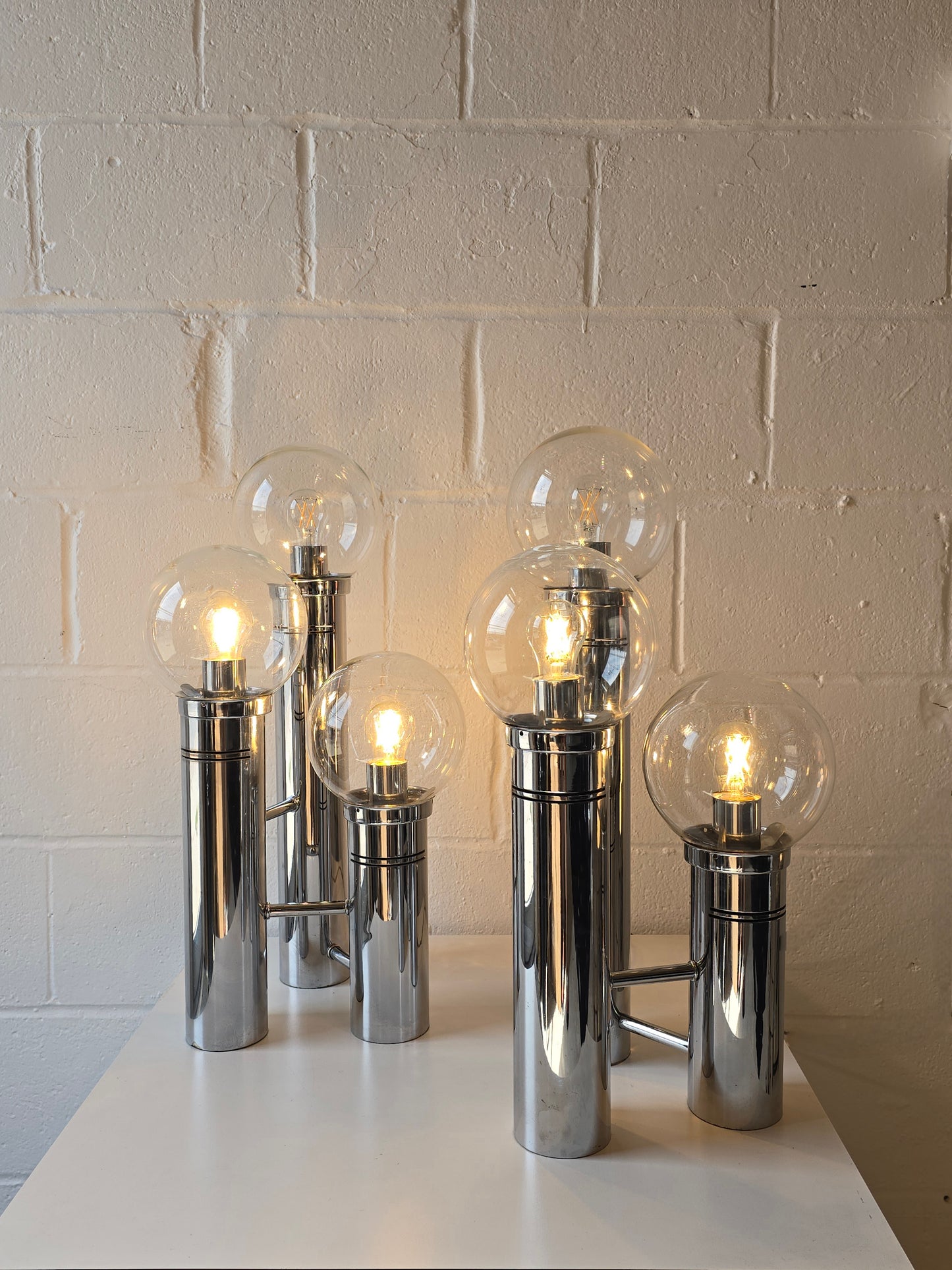 Glass Globe And Tubular Chrome Table Lamps
