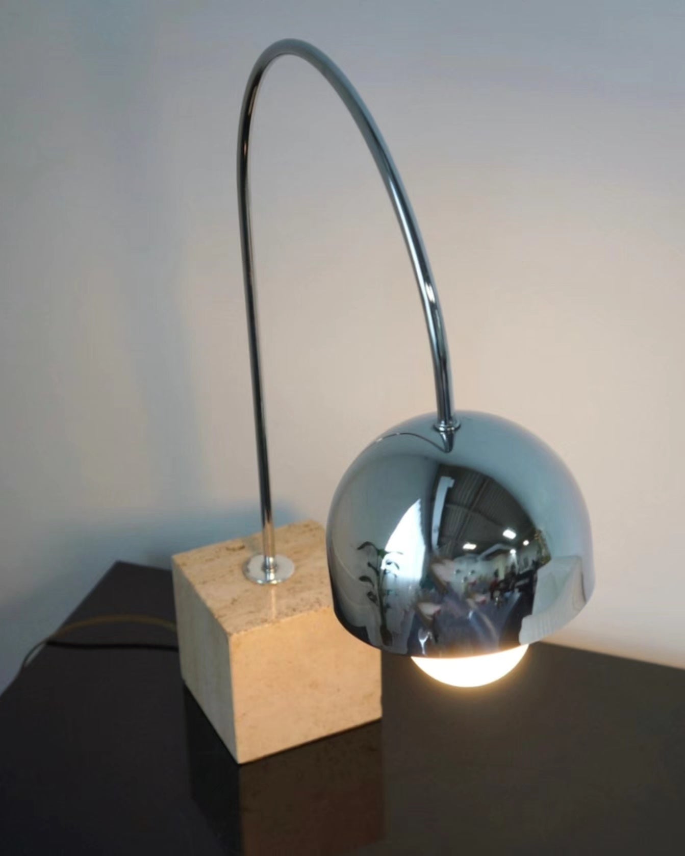 Harvey Guzzini Arc Chrome and Travertine Table Lamp
