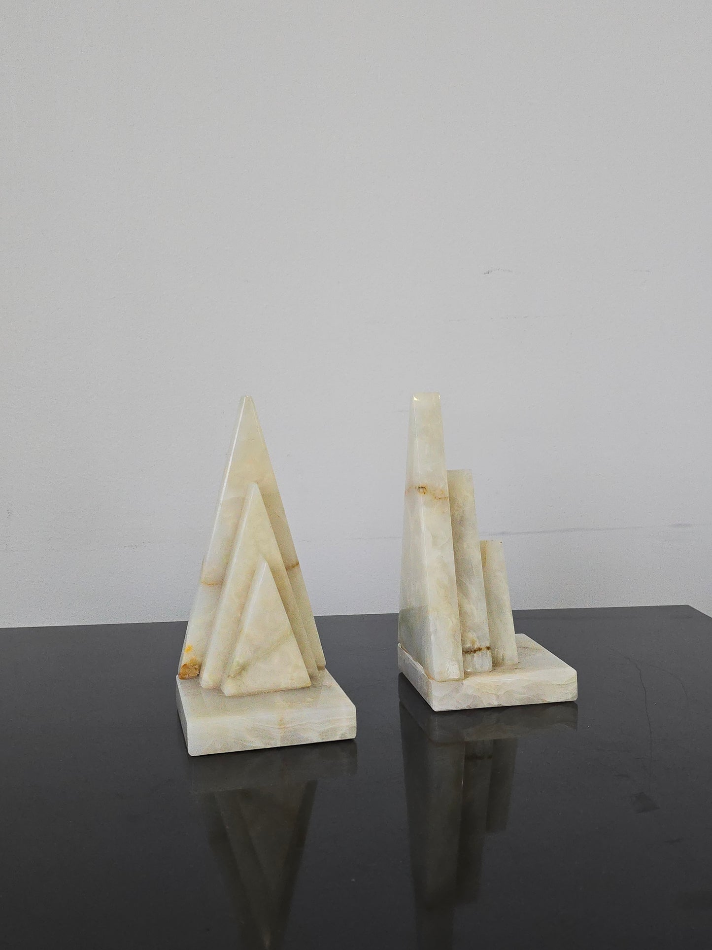 Pair of sculptural onyx stone bookends