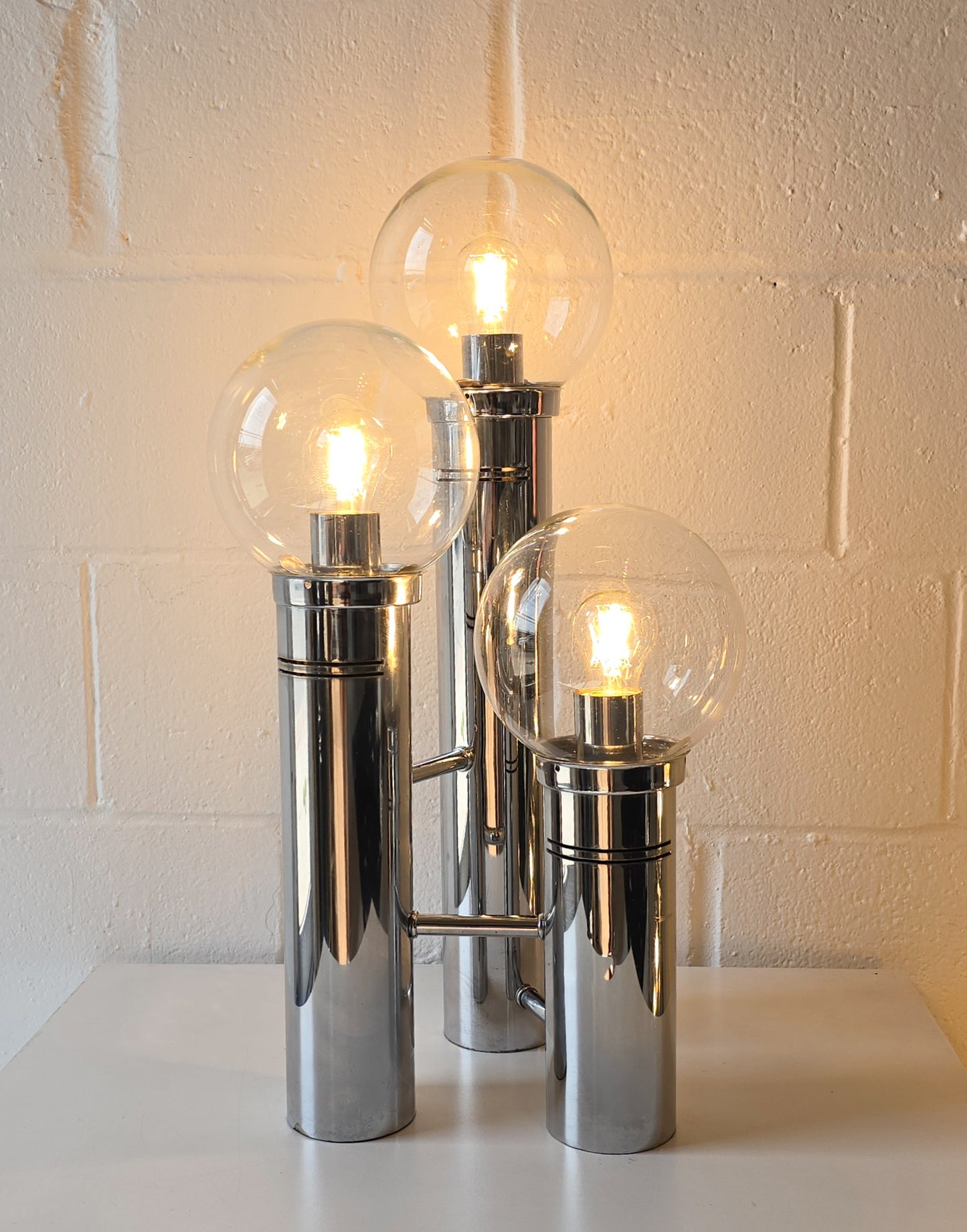 Glass Globe And Tubular Chrome Table Lamps