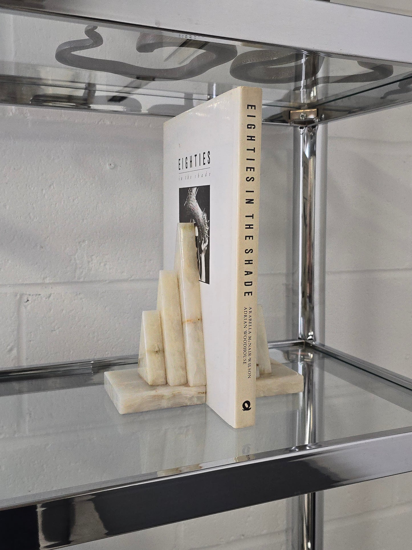 Pair of sculptural onyx stone bookends