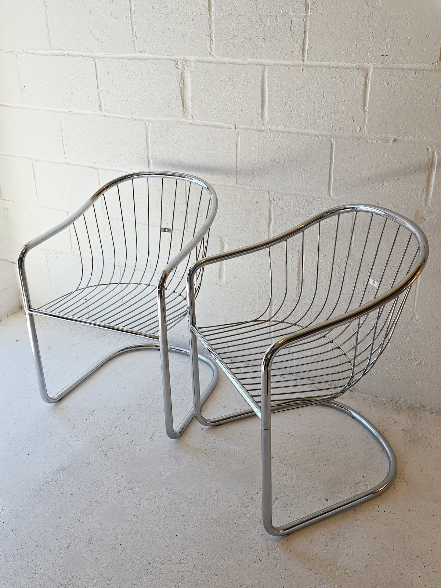 Cantilevered Chrome Chairs (One pair available)