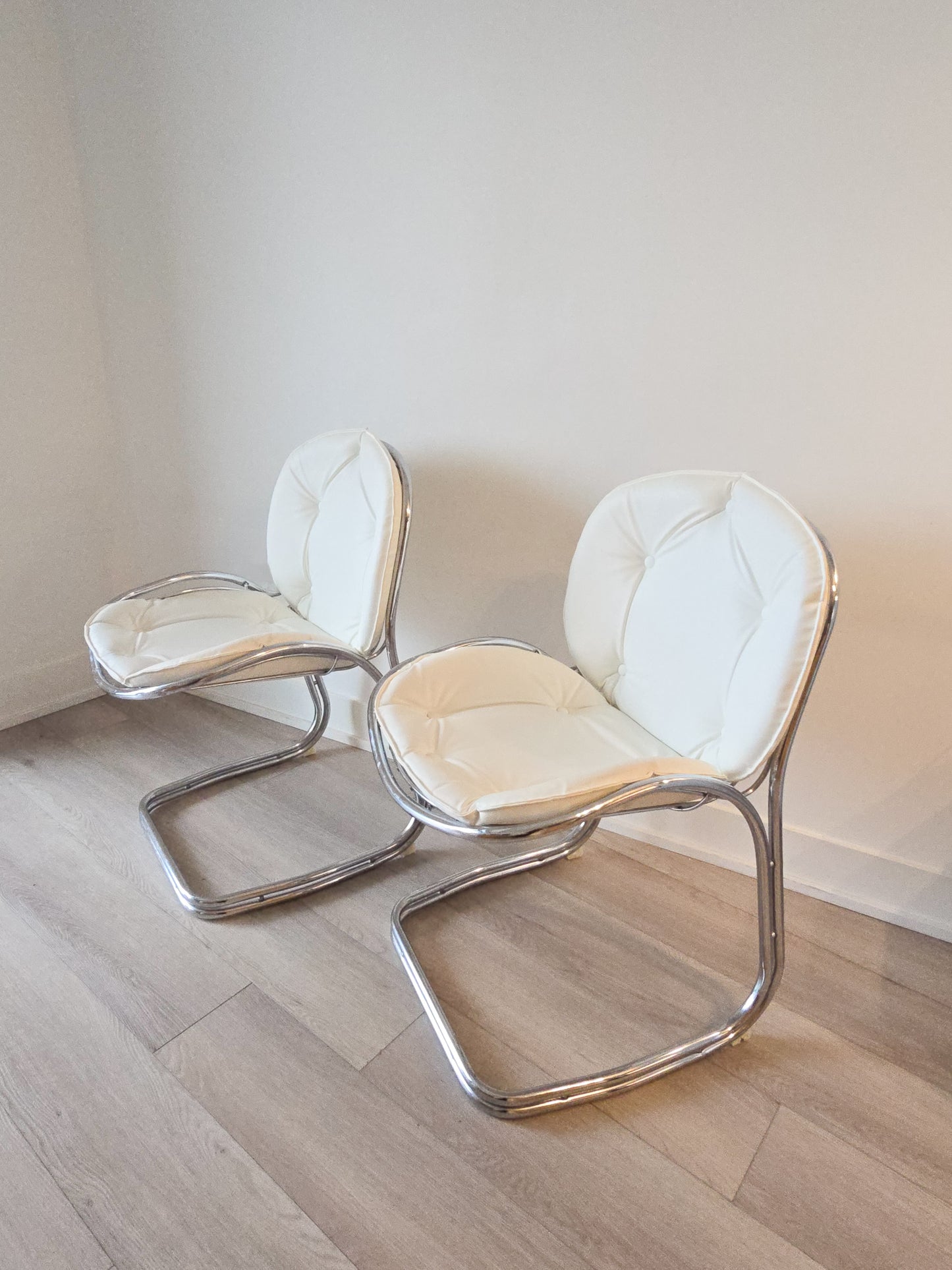 Cantilevered Chrome and leather chairs