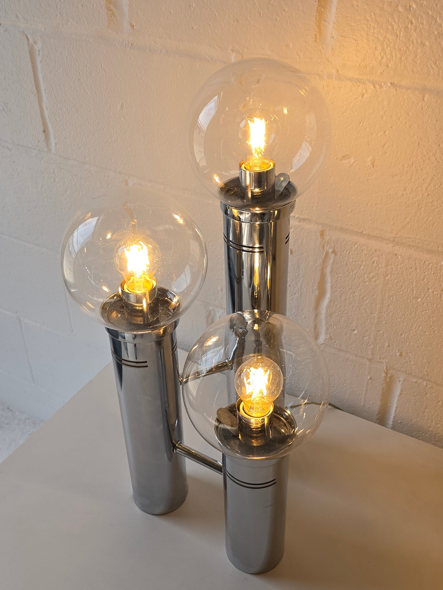 Glass Globe And Tubular Chrome Table Lamps