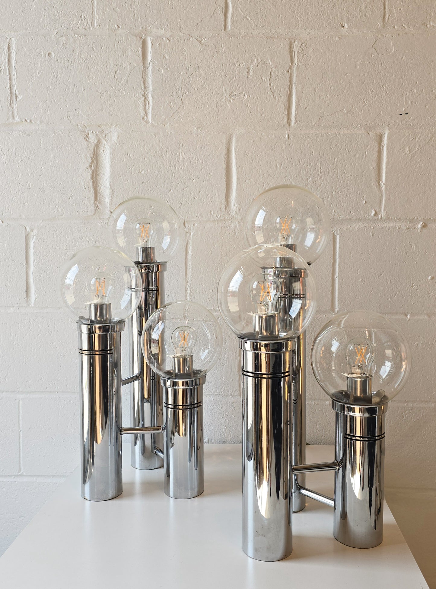 Glass Globe And Tubular Chrome Table Lamps